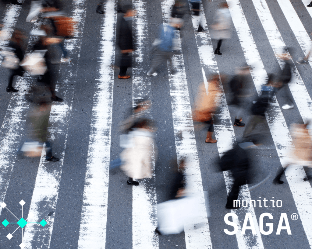 Crowd of people crossing a city street, representing anonymity and online movement.