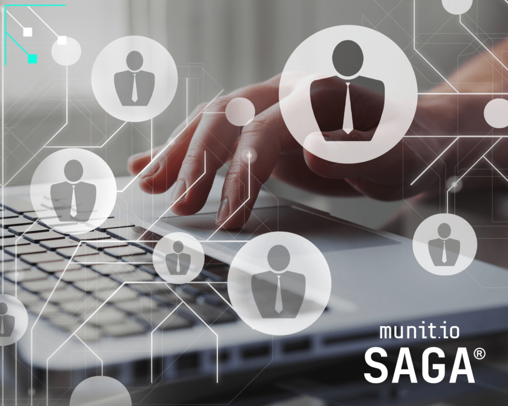 Hands typing on a laptop surrounded by digital icons of executives, symbolizing how executive monitoring solutions track and protect high-level personnel across digital environments.