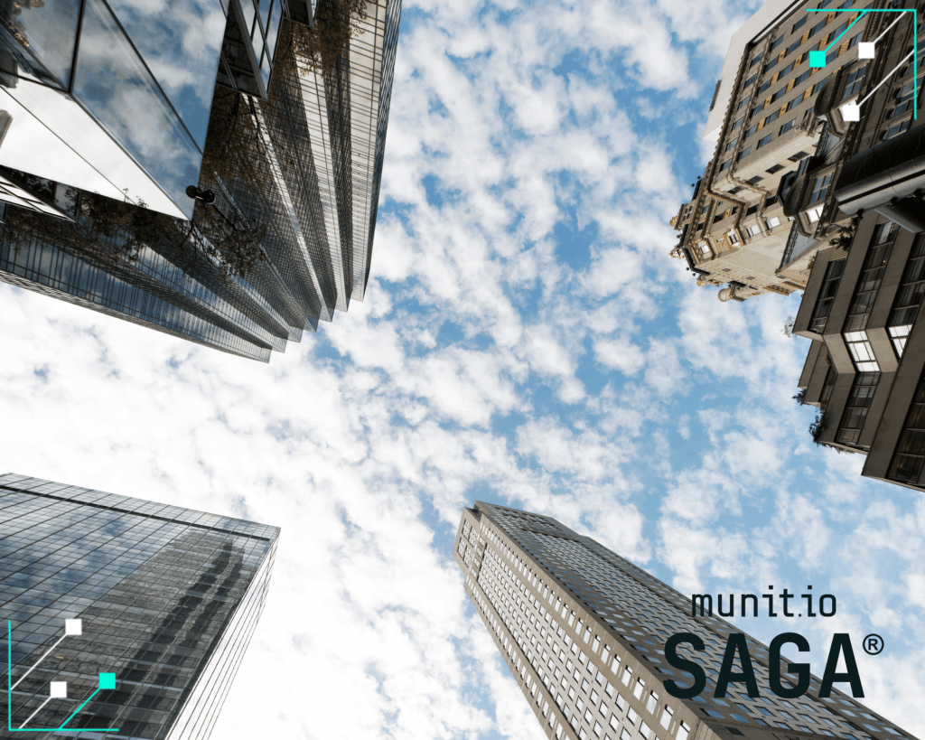 Skyscrapers reflecting the sky symbolize the scale of digital infrastructure, highlighting the importance of what is an insider threat cyber awareness for protecting organizations.