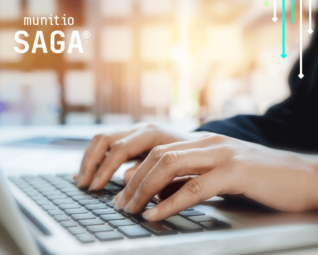 Hands typing on a laptop keyboard with digital graphics, illustrating what is an insider threat cyber awareness and the importance of detecting risks from within organizations through proactive monitoring and education.