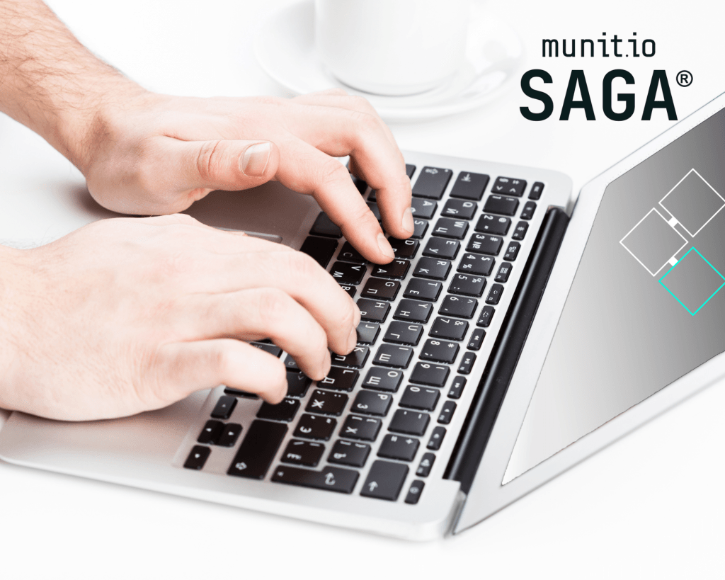 Hands typing on a laptop keyboard, representing how digital workflows and data analysis contribute to maximizing Threat Intelligence ROI.