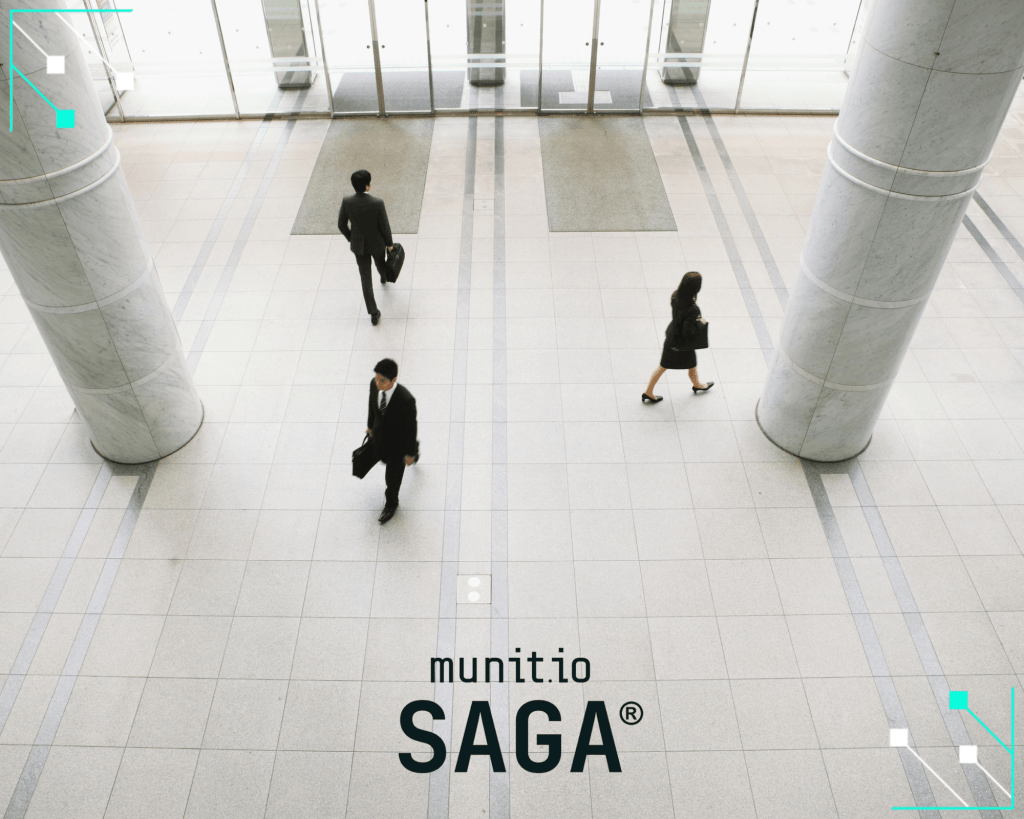 Business professionals walking through a modern office lobby, representing the need for Supply Chain Intelligence to monitor vendor-related risks in dynamic corporate environments.