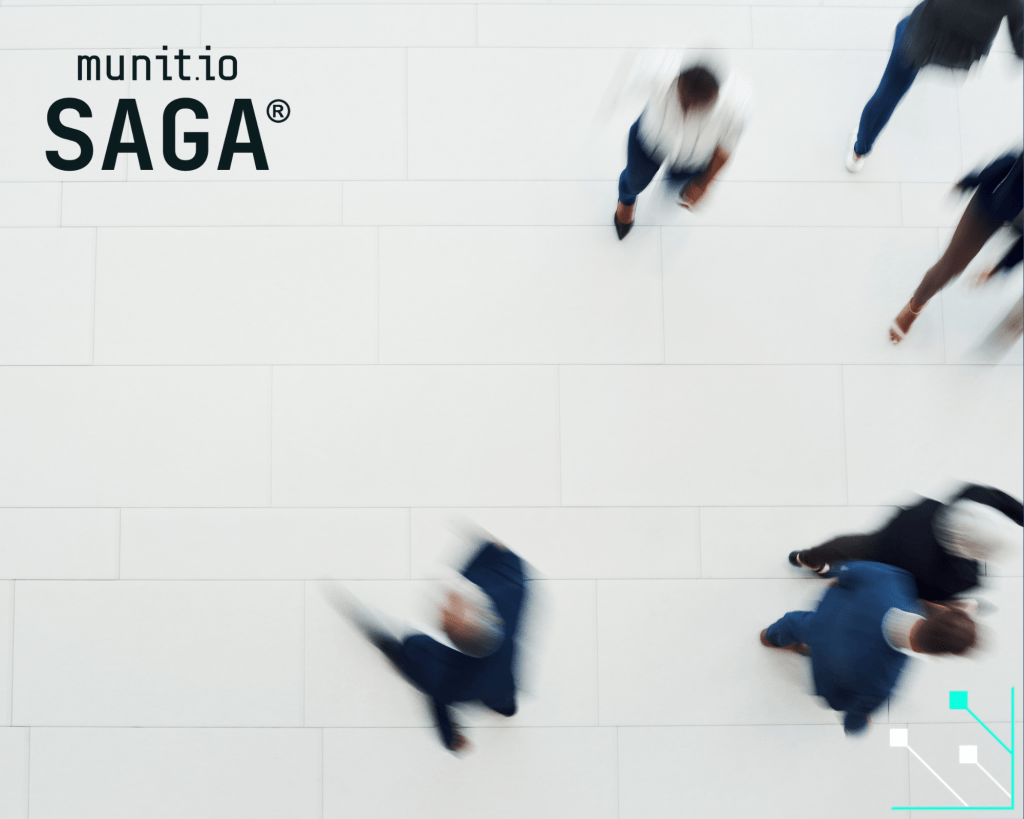 Blurred business professionals walking across a modern office floor, representing dynamic decision-making and the role of Threat Intelligence ROI in managing cyber risk.