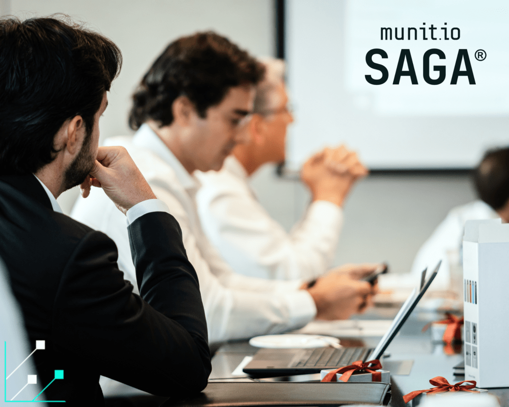 Business professionals in a meeting discussing cybersecurity strategies and data protection, highlighting the importance of external threat monitoring for financial services in preventing cyber risks and ensuring compliance.