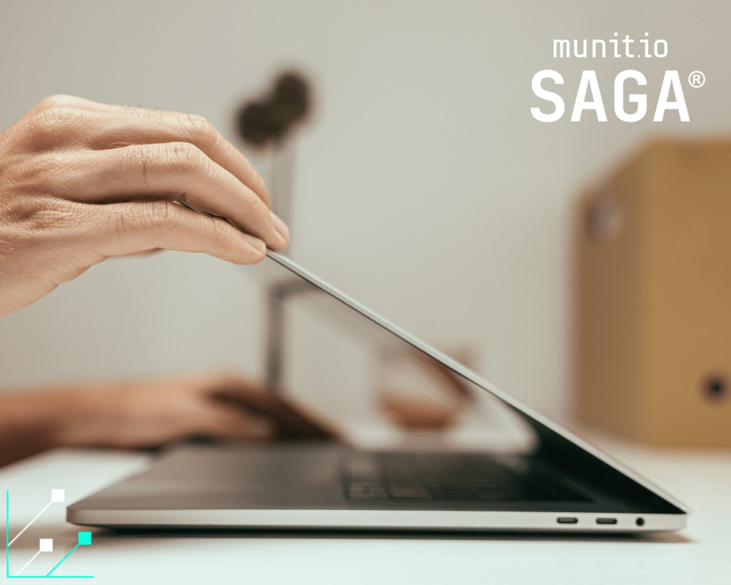 A person closing a laptop, symbolizing secure data handling and proactive cybersecurity practices that support how to stay compliant with NIS2 directive requirements.