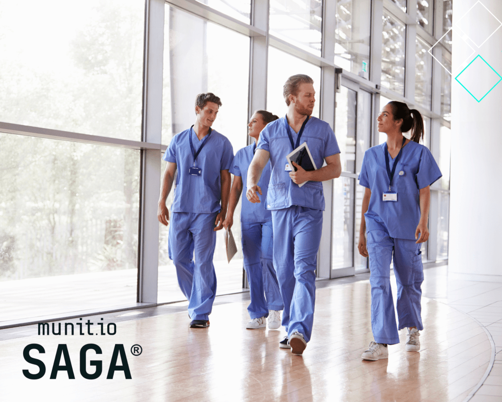 Healthcare professionals walking together in a hospital corridor, symbolizing collaboration and data protection supported by dark web intelligence for healthcare companies to secure patient information and digital systems.