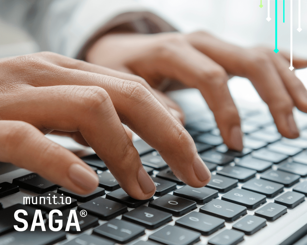 Close-up of hands typing on a laptop keyboard, representing active cybersecurity monitoring and illustrating what are external digital risks through real-time detection of online threats and data exposure.