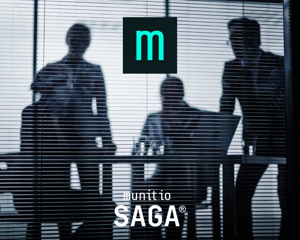 Business professionals silhouetted behind glass in a meeting room, representing executive teams discussing cybersecurity strategy and how do hackers find company data to strengthen organisational defence.