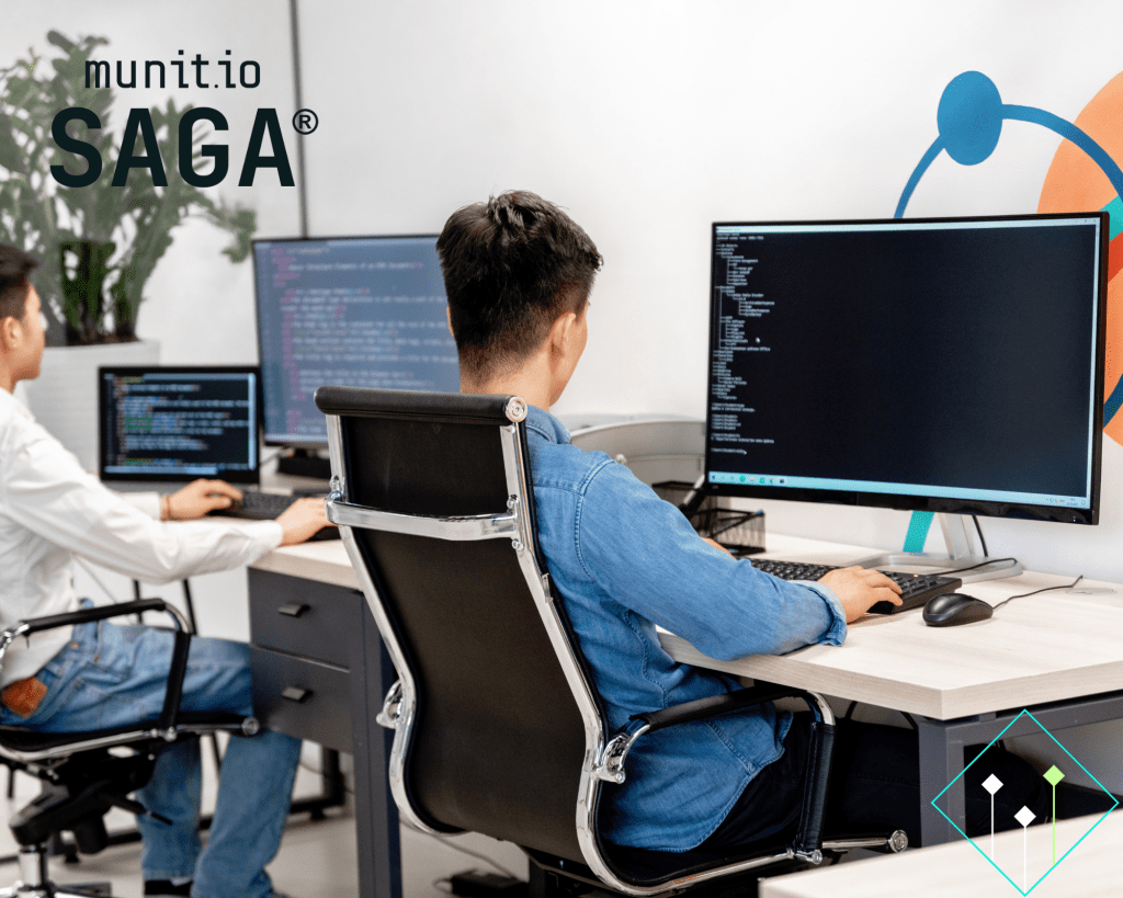 Two cybersecurity professionals working at computer screens with code and data, representing technical analysis of threats and how do hackers find company data through exposed systems.