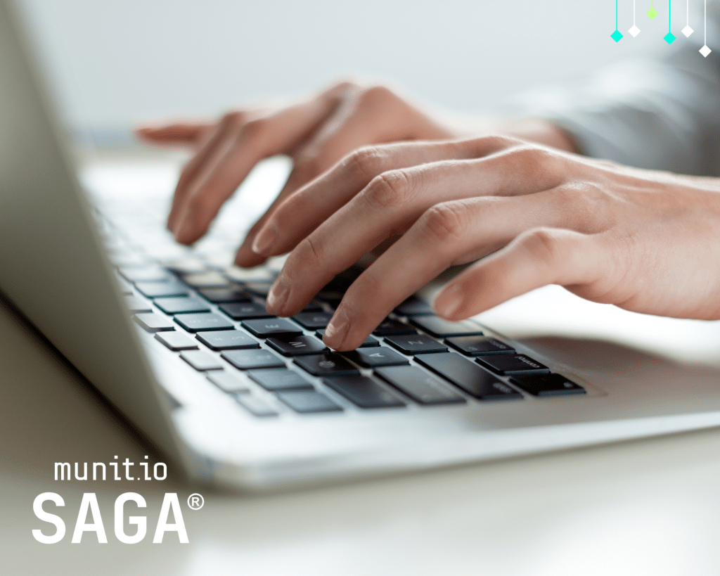 Hands typing on a laptop keyboard, representing active cybersecurity work and illustrating what is phishing domain monitoring through real-time analysis of suspicious domains and online threats.