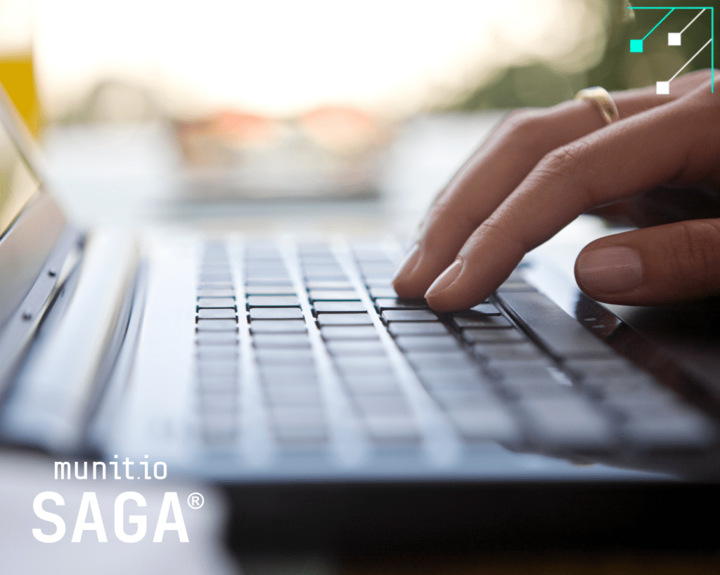 Close-up of a hand typing on a laptop keyboard, emphasizing online activity and data exposure risks related to How data brokers sell your information.