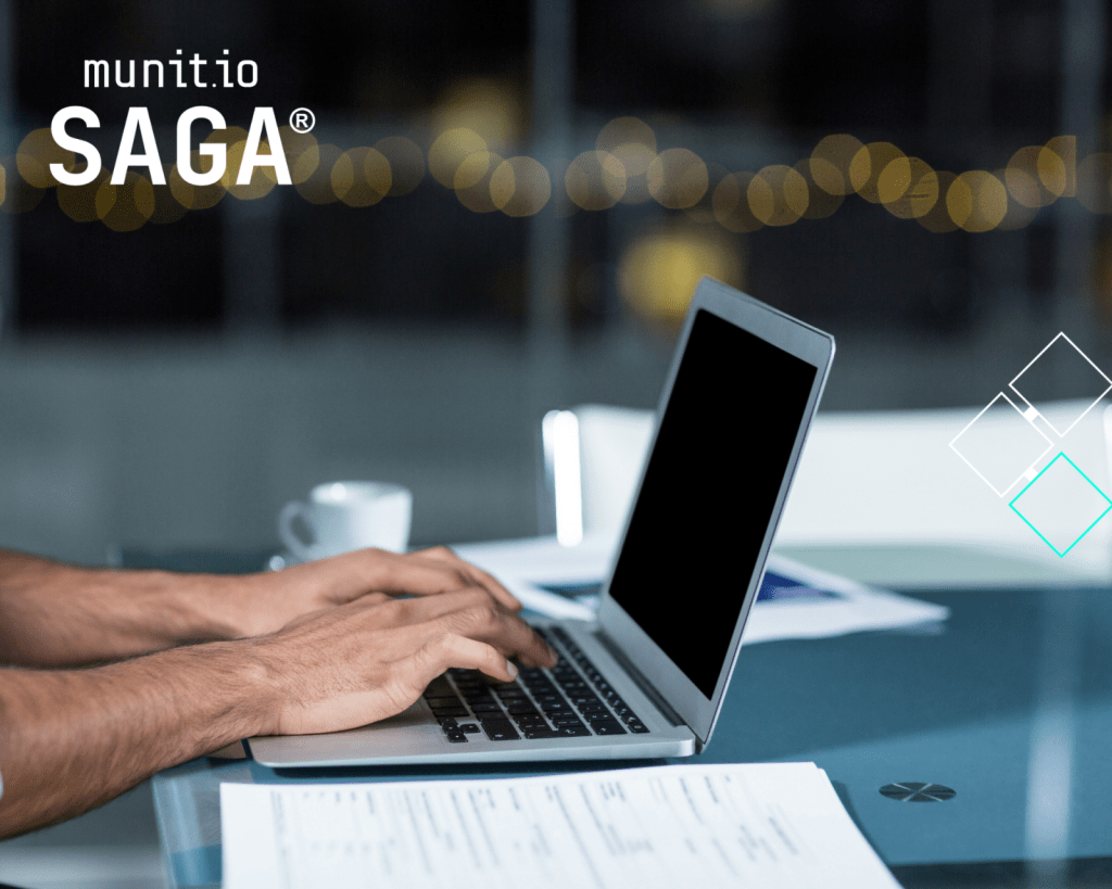 Professional hands typing on a laptop at a modern desk, illustrating how organizations assess external exposure to understand the Types of data sold on the dark web and the risks associated with stolen digital assets.