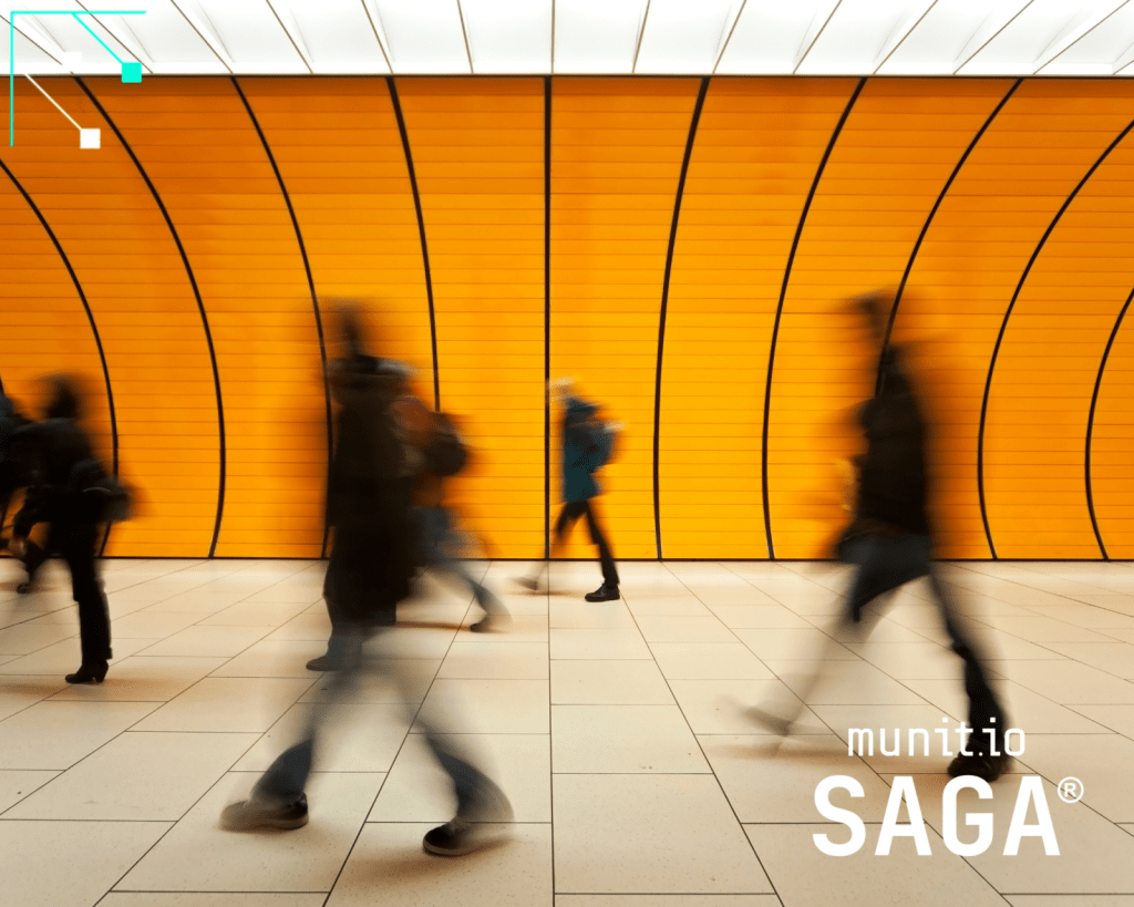 Crowds of blurred pedestrians walking through a brightly lit corridor illustrate the fast-moving online environment where understanding How to detect fake online stores helps organizations protect users, data, and brand trust.