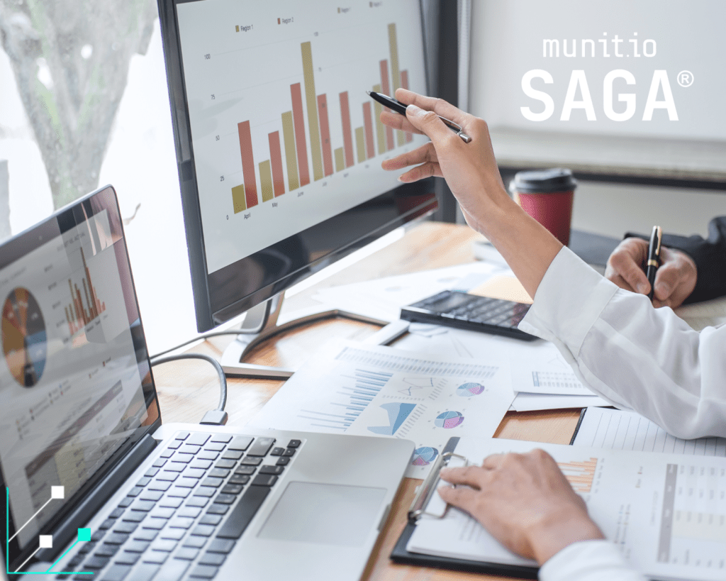 Professionals analyzing charts and dashboards on multiple screens, illustrating what is brand impersonation through data analysis used to detect suspicious activity, fraudulent patterns, and misuse of brand assets.