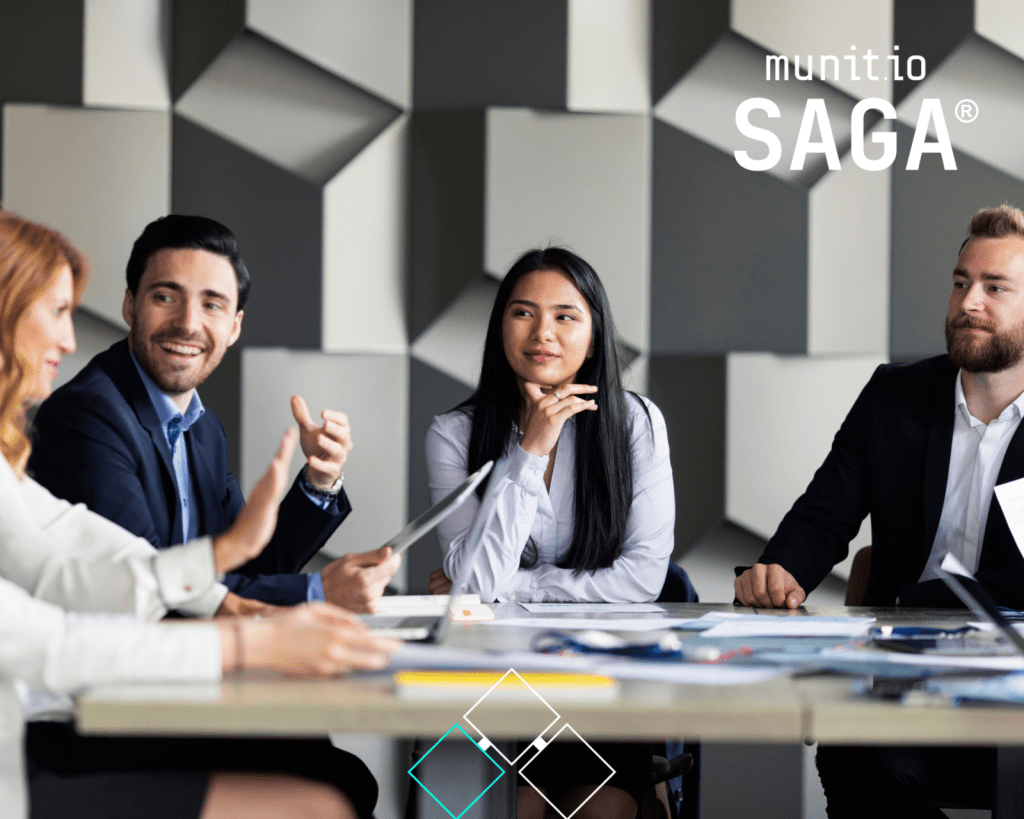 A diverse business team reviewing documents and discussing strategy at a conference table, supporting the topic What is typosquatting and how teams collaborate to mitigate domain-based cyber threats.