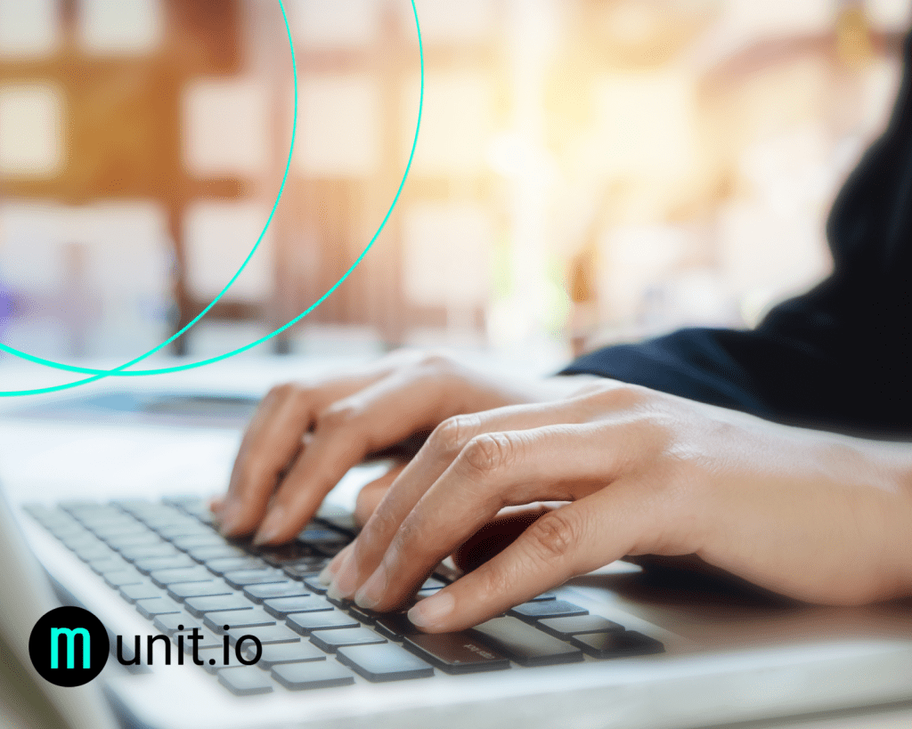 Hands typing on a laptop keyboard, illustrating How much does dark web monitoring cost? through continuous monitoring, threat detection, and proactive digital risk protection.